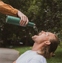 Load image into Gallery viewer, Insulated wine bottle, wine cooler, green plonk bottle, white wine bottle man drinking wine